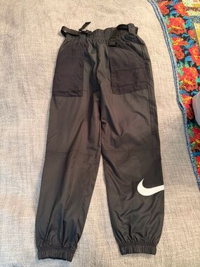 Nike Black Windbreaker Track Pants with White Swoosh